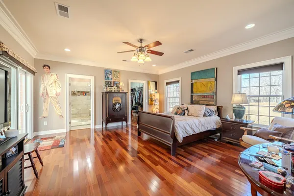 a bed room with a bed and a window