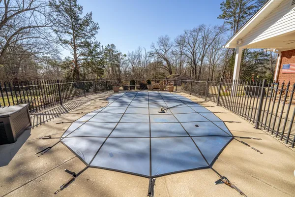 a view of a backyard of the house