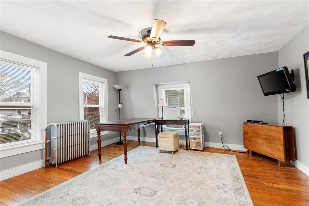 687 Main Street Wakefield, MA 01880 - Photo 28 of 36 a living room with furniture and a window