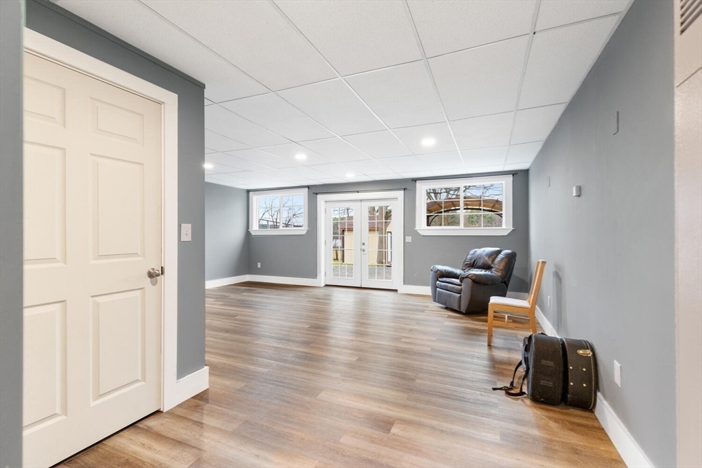 687 Main Street Wakefield, MA 01880 - Photo 30 of 36 a living room with furniture and wooden floor