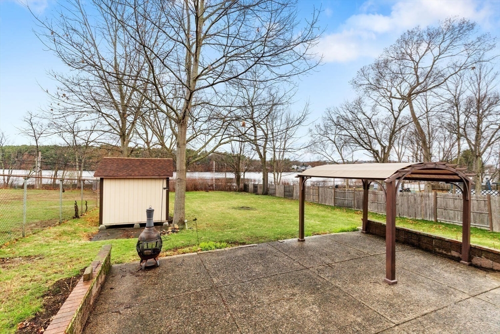 687 Main Street Wakefield, MA 01880 - Photo 35 of 36 a view of a house with backyard and garden
