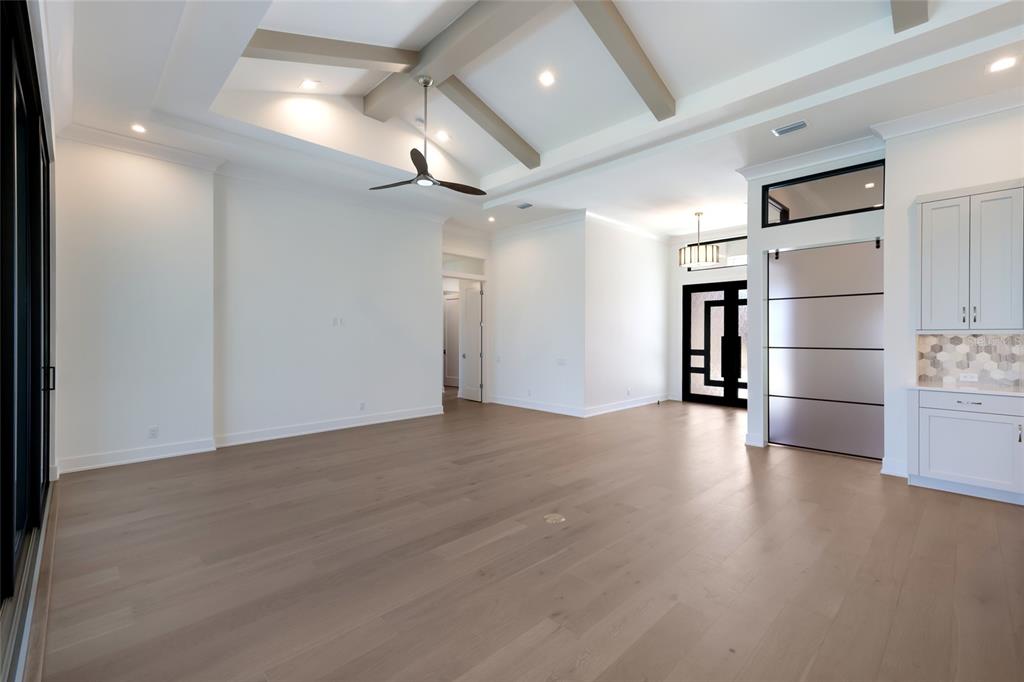 1107 Blue Shell Loop Sarasota, FL 34240 - Photo 12 of 88 a view of a livingroom with wooden floor