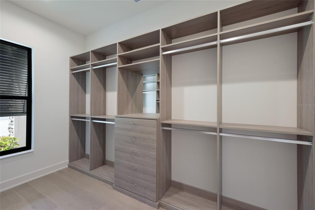 1107 Blue Shell Loop Sarasota, FL 34240 - Photo 30 of 88 a room with an empty walk in closet