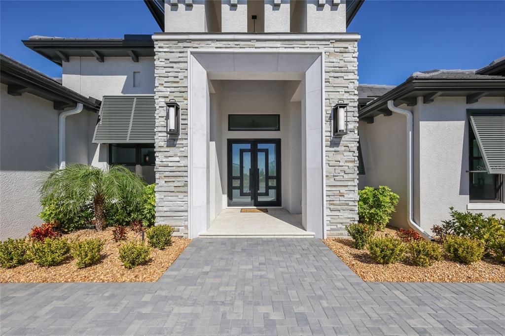 1107 Blue Shell Loop Sarasota, FL 34240 - Photo 3 of 88 front view of a house