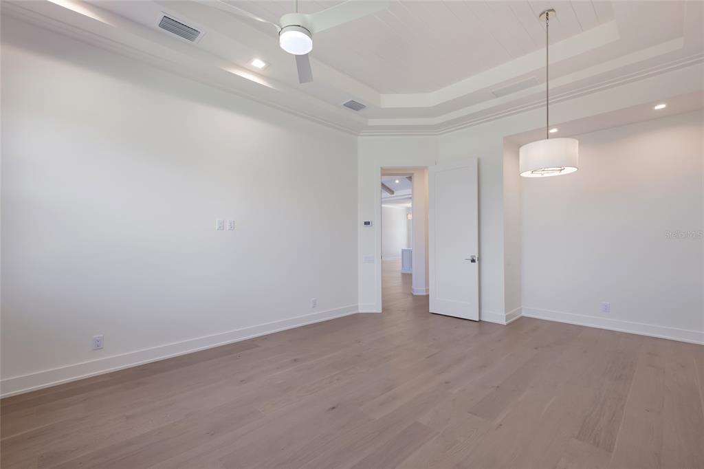 1107 Blue Shell Loop Sarasota, FL 34240 - Photo 37 of 88 a view of an empty room with a window