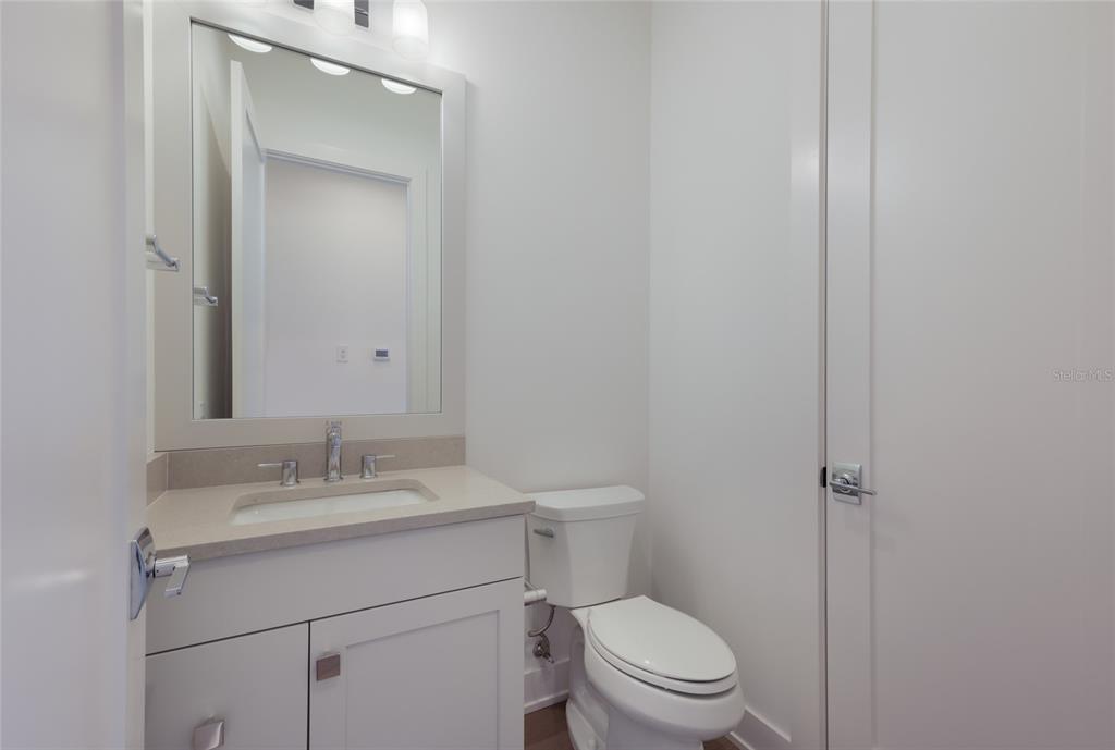 1107 Blue Shell Loop Sarasota, FL 34240 - Photo 38 of 88 a bathroom with a sink toilet and vanity
