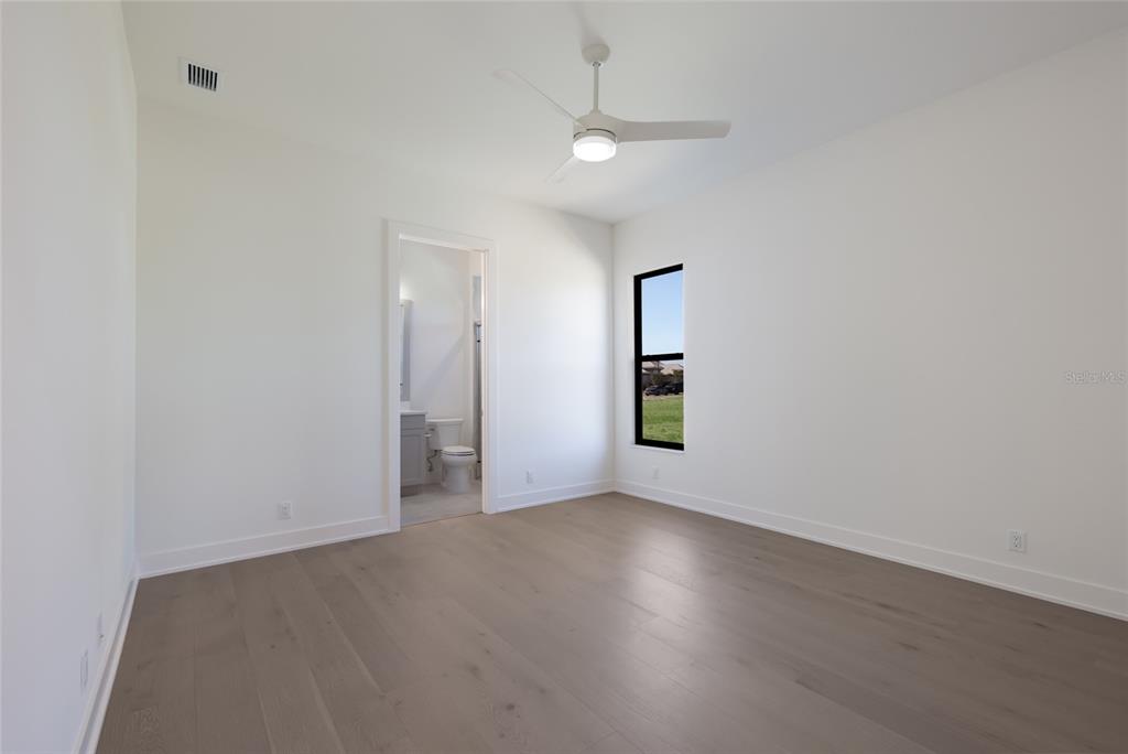 1107 Blue Shell Loop Sarasota, FL 34240 - Photo 39 of 88 an empty room with a empty space and a window