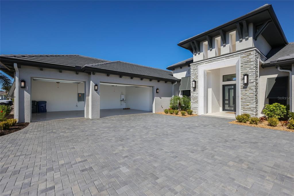 1107 Blue Shell Loop Sarasota, FL 34240 - Photo 58 of 88 a view of a house with a garage and a garage