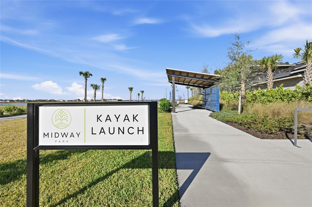 1107 Blue Shell Loop Sarasota, FL 34240 - Photo 68 of 88 a sign on the side of a building