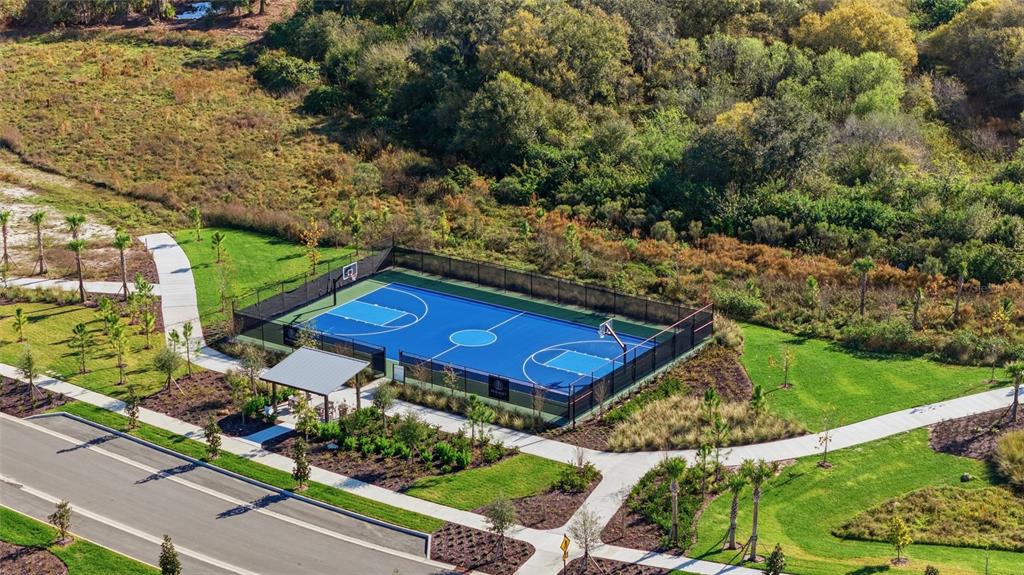 1107 Blue Shell Loop Sarasota, FL 34240 - Photo 72 of 88 a view of a two chairs in the yard