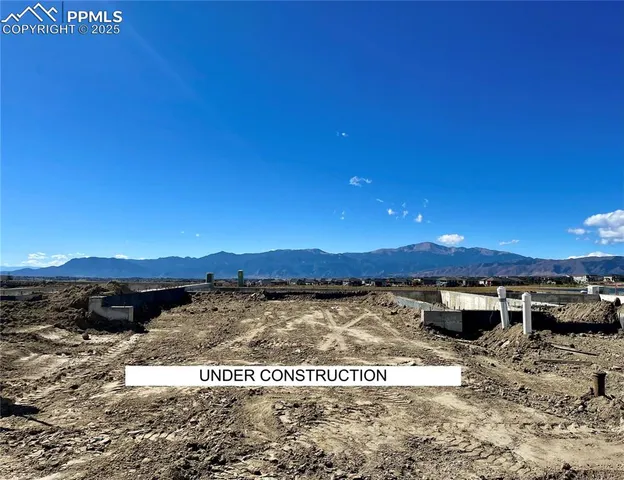 a view of a lake with sunset