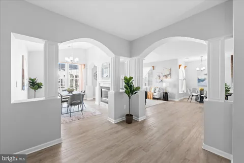 a view of a living room and dining room