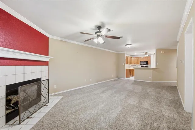 a view of a kitchen with furniture and a fireplace