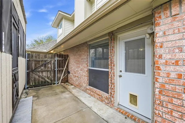 a view of a balcony with door