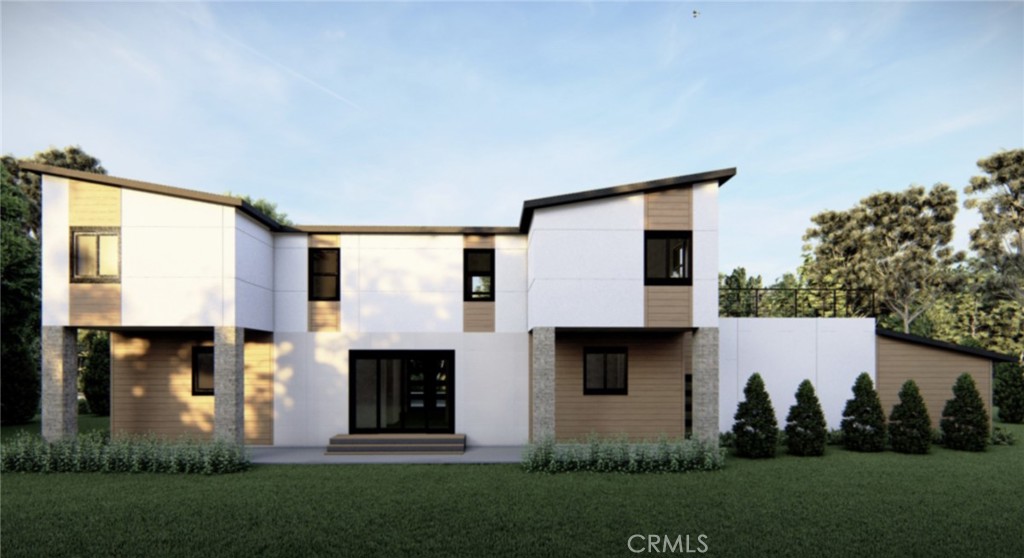 9421 Perrett Road Patterson, CA 95363 - Photo 2 of 3 a front view of a house with a garden