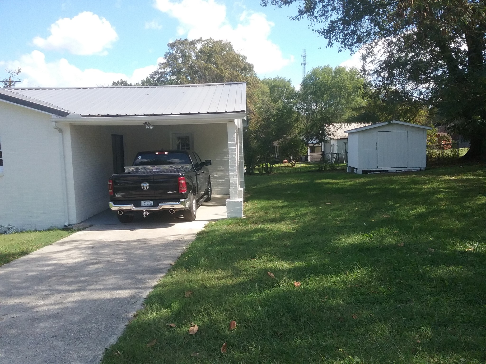 211 Locust Street Alexandria, TN 37012 - Photo 13 of 13 a view of a car parked in the yard