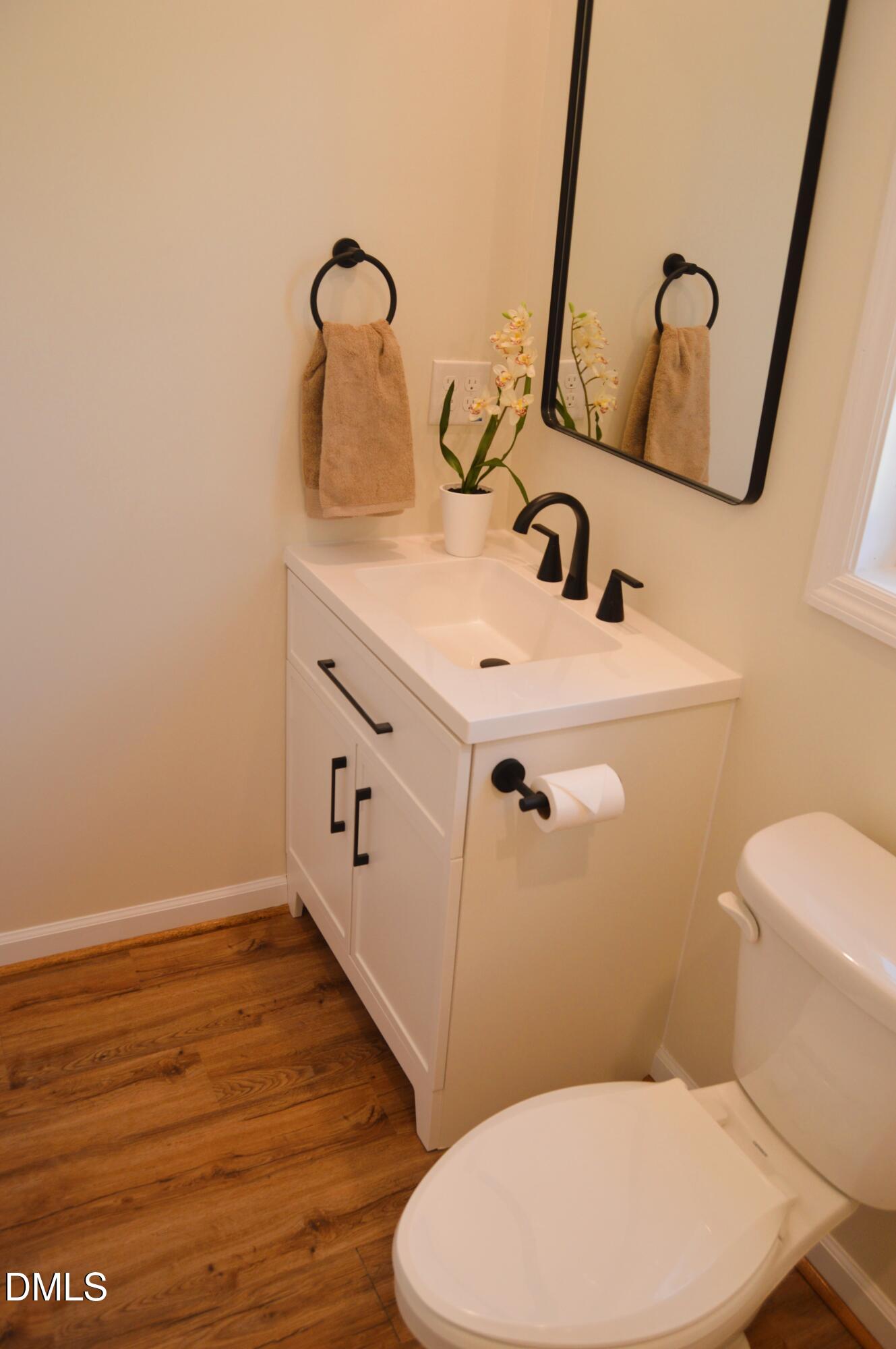 1159 No Bottom Road Warrenton, NC 27589 - Photo 21 of 43 a bathroom with a sink and mirror