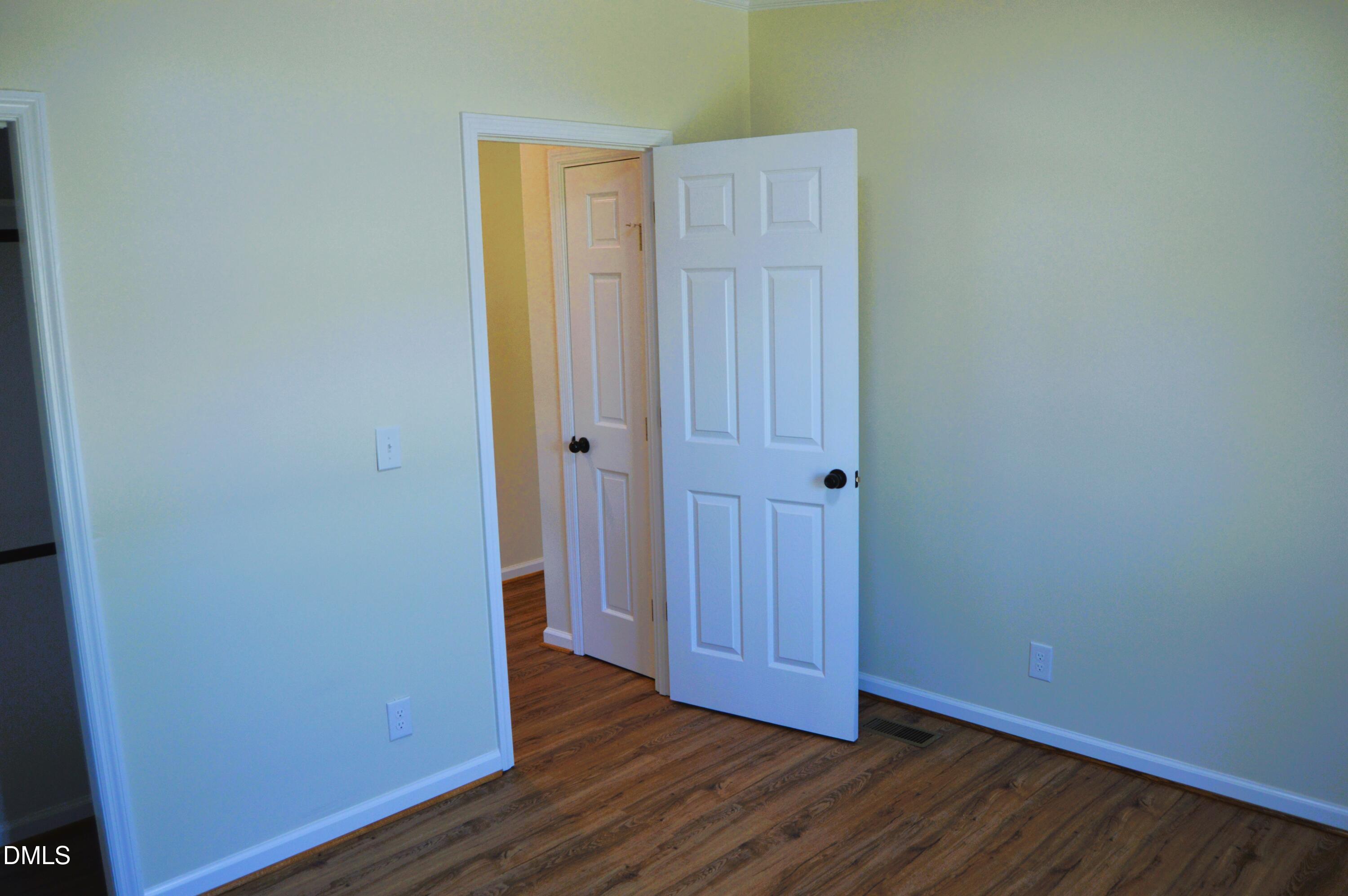 1159 No Bottom Road Warrenton, NC 27589 - Photo 22 of 44 a view of wooden floor and closet in a room