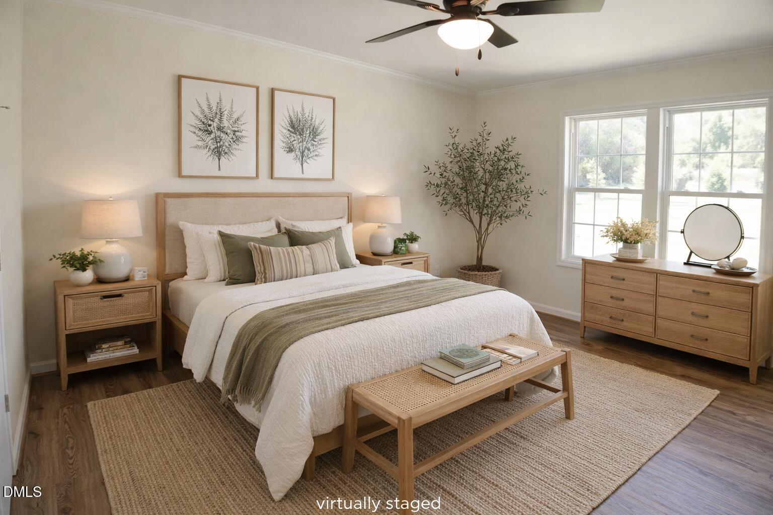 1159 No Bottom Road Warrenton, NC 27589 - Photo 27 of 43 a bedroom with a bed a dresser and paintings on the wall