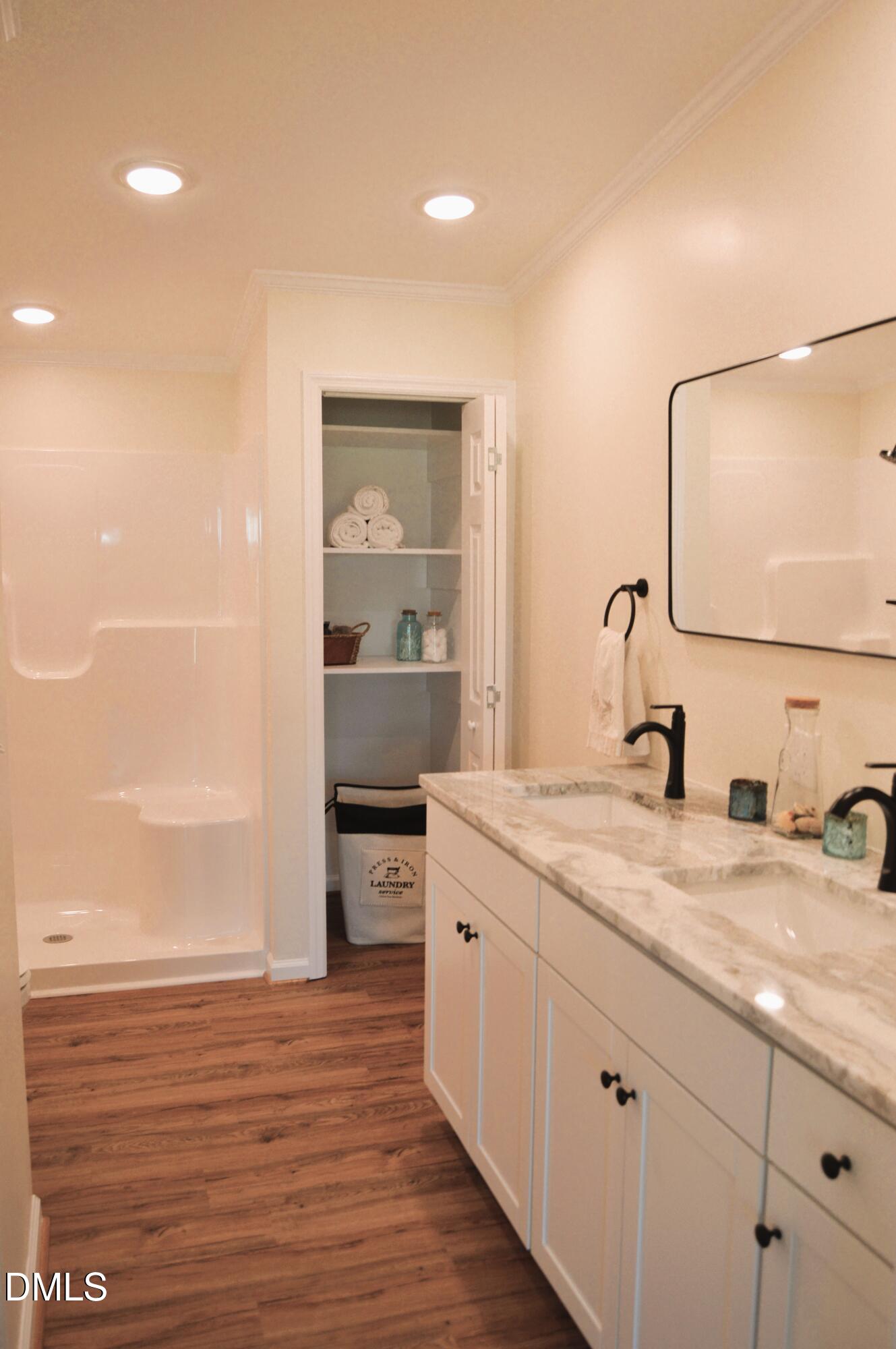 1159 No Bottom Road Warrenton, NC 27589 - Photo 30 of 43 a bathroom with a granite countertop sink and a mirror