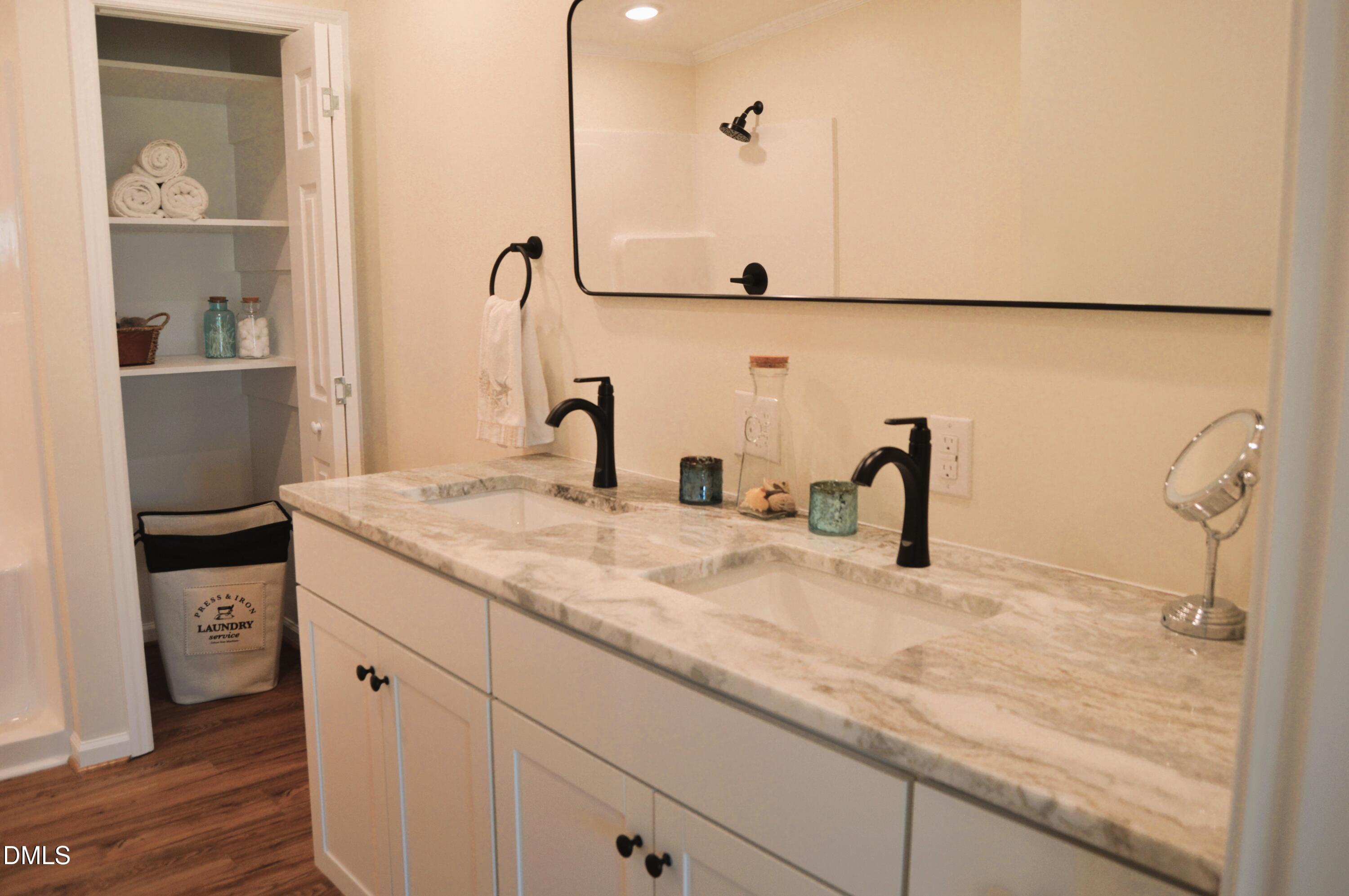 1159 No Bottom Road Warrenton, NC 27589 - Photo 31 of 43 a bathroom with a sink and a mirror