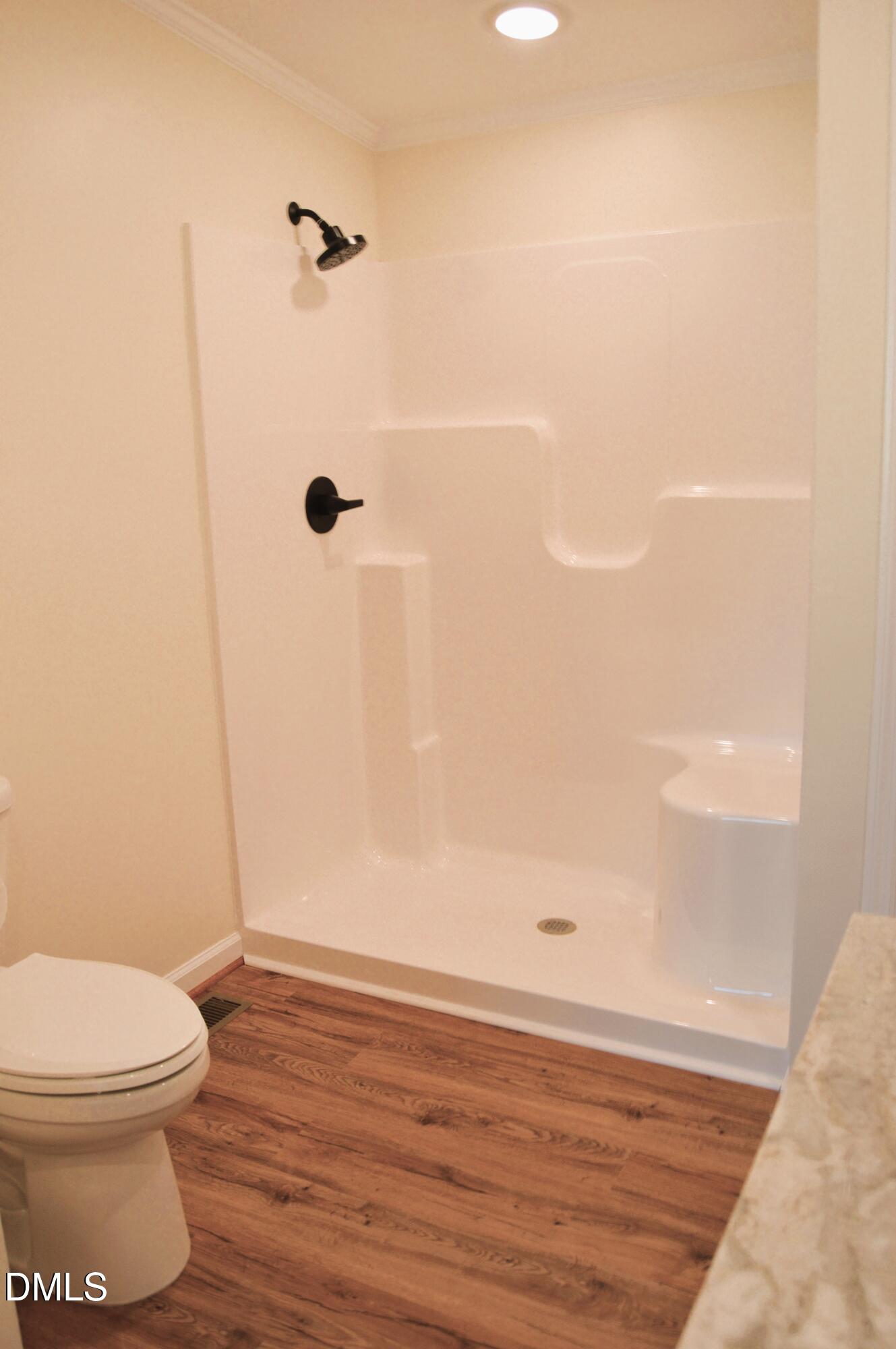 1159 No Bottom Road Warrenton, NC 27589 - Photo 32 of 43 a bathroom with a toilet and a shower