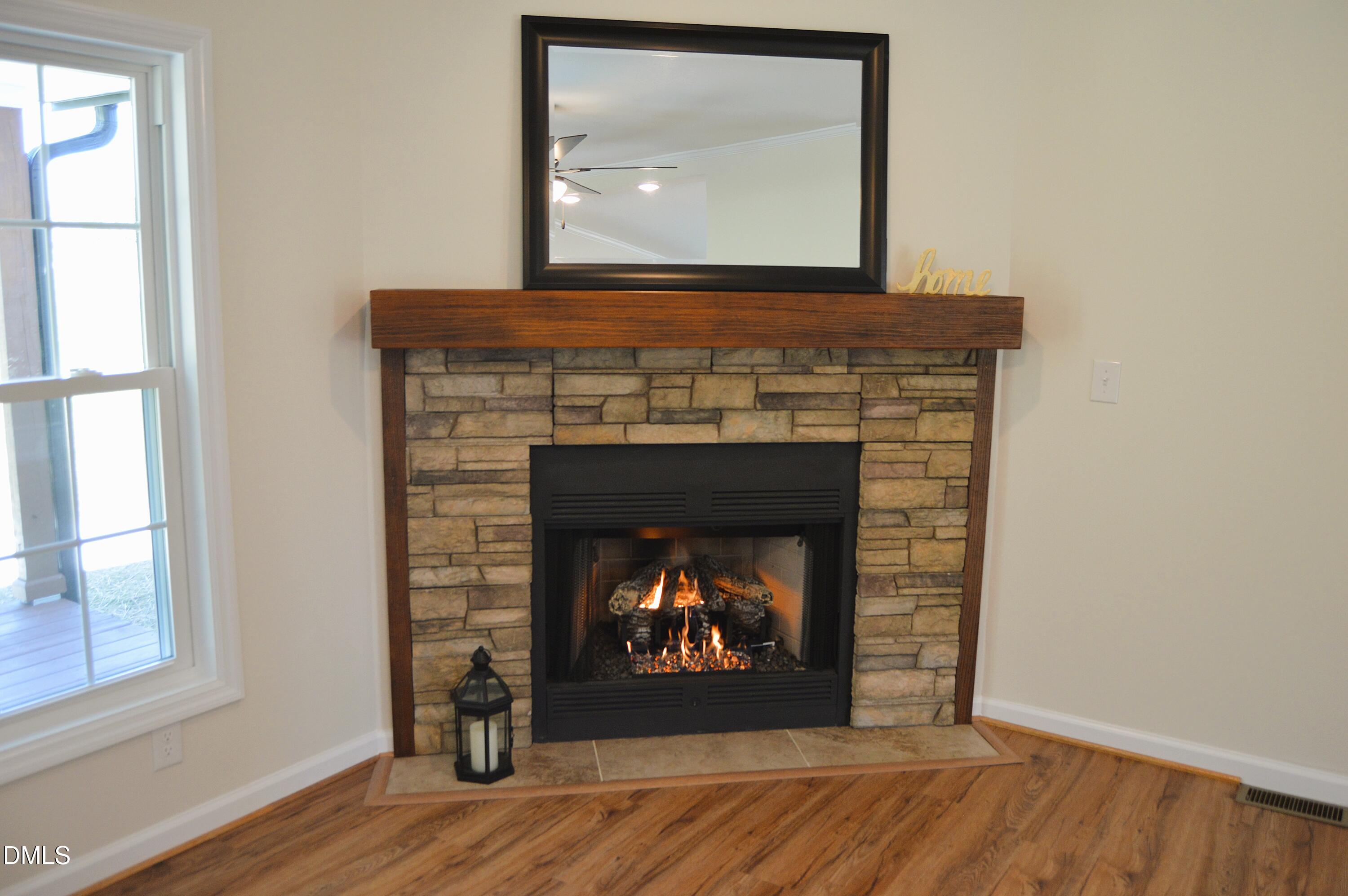 1159 No Bottom Road Warrenton, NC 27589 - Photo 9 of 43 a living room with a fireplace