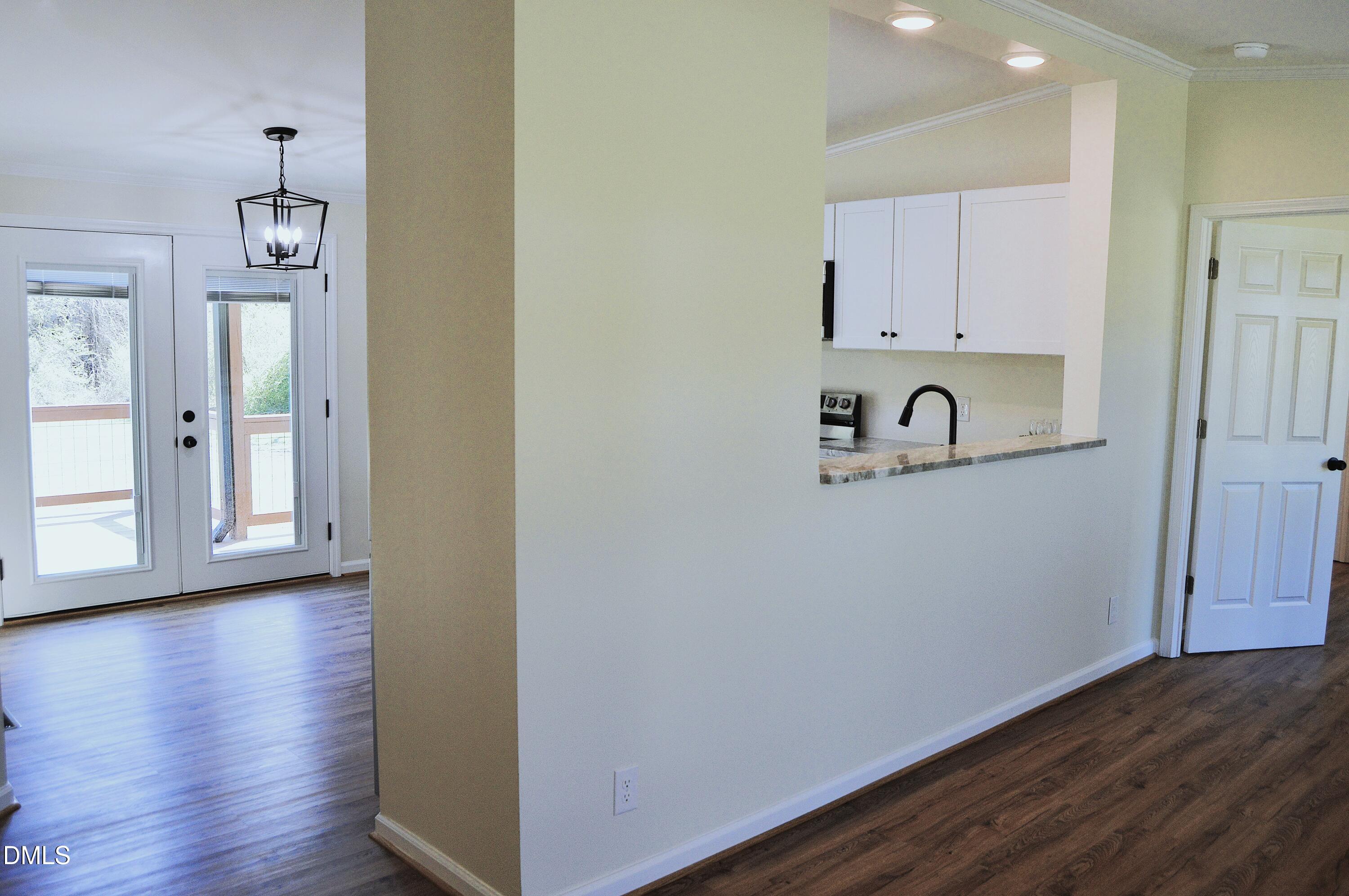 1159 No Bottom Road Warrenton, NC 27589 - Photo 10 of 43 a room with wooden floor