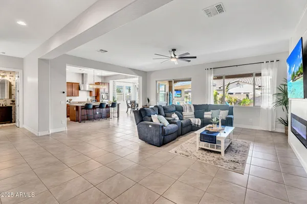a kitchen with sink and center island