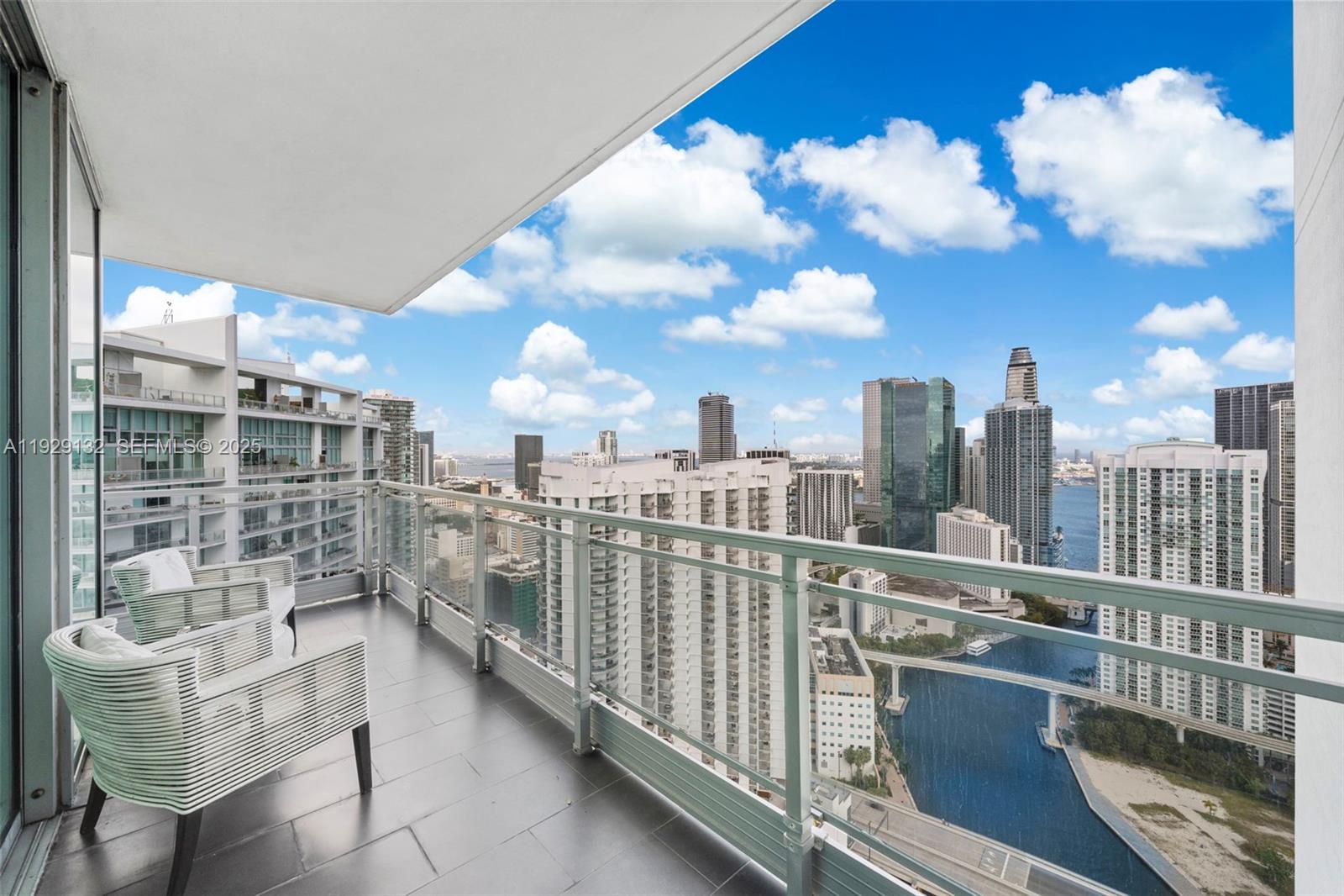 92 Southwest 3rd Street, Unit 4610 Miami, FL 33130 - Photo 15 of 16 a view of a balcony with city view