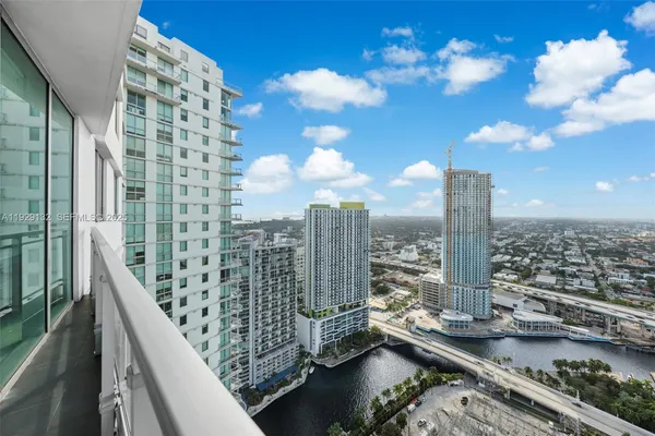 a view of a balcony with city view