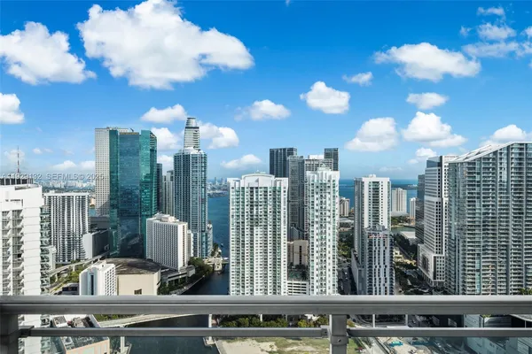 a view of a city with tall buildings