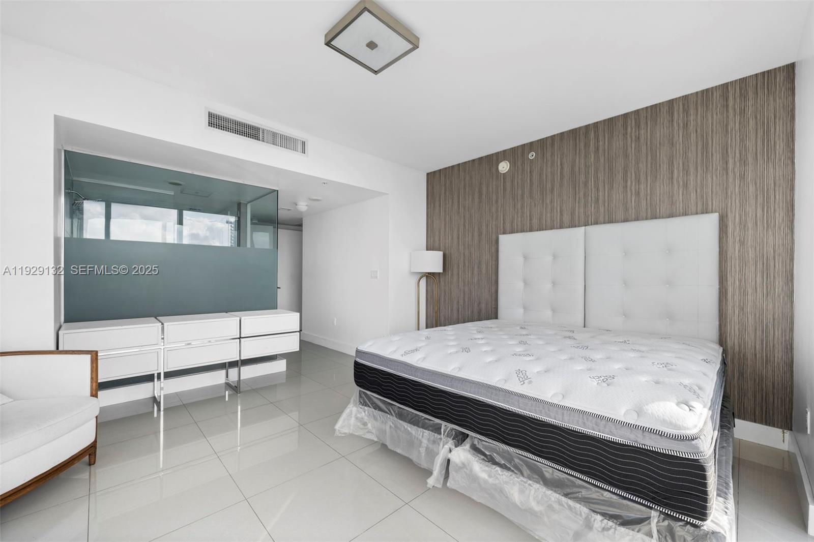 92 Southwest 3rd Street, Unit 4610 Miami, FL 33130 - Photo 8 of 16 a living room with furniture and a table