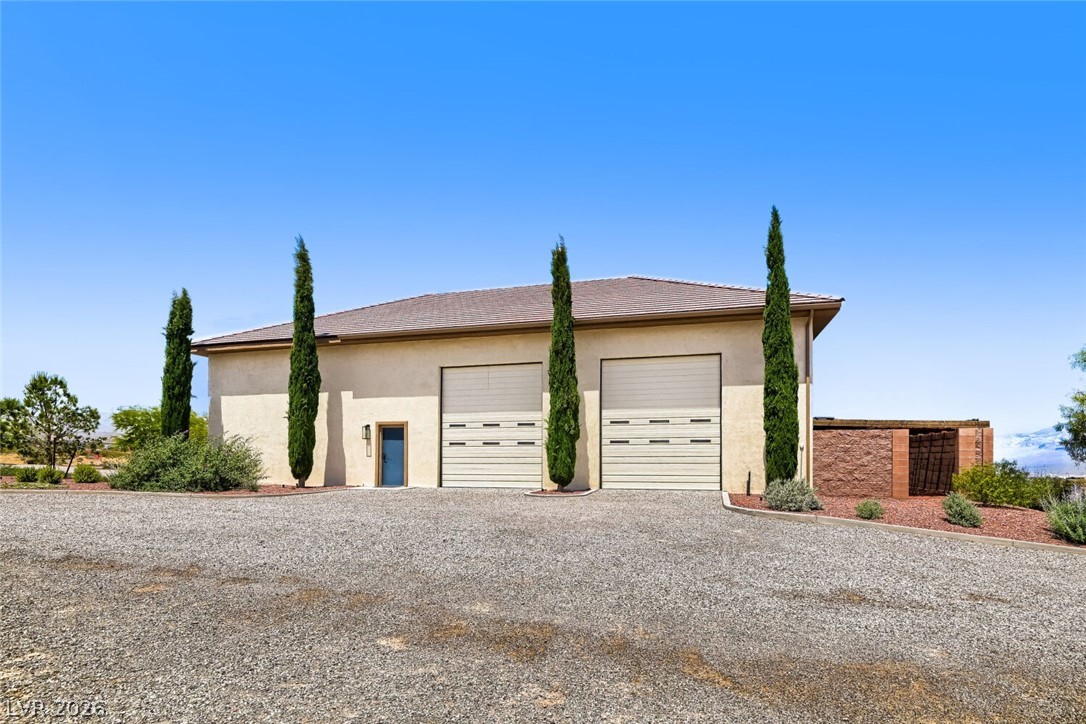 13490 Racel Street Las Vegas, NV 89166 - Photo 13 of 99 Side of RV Garage/Workshop