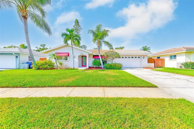 a view of room with window and door
