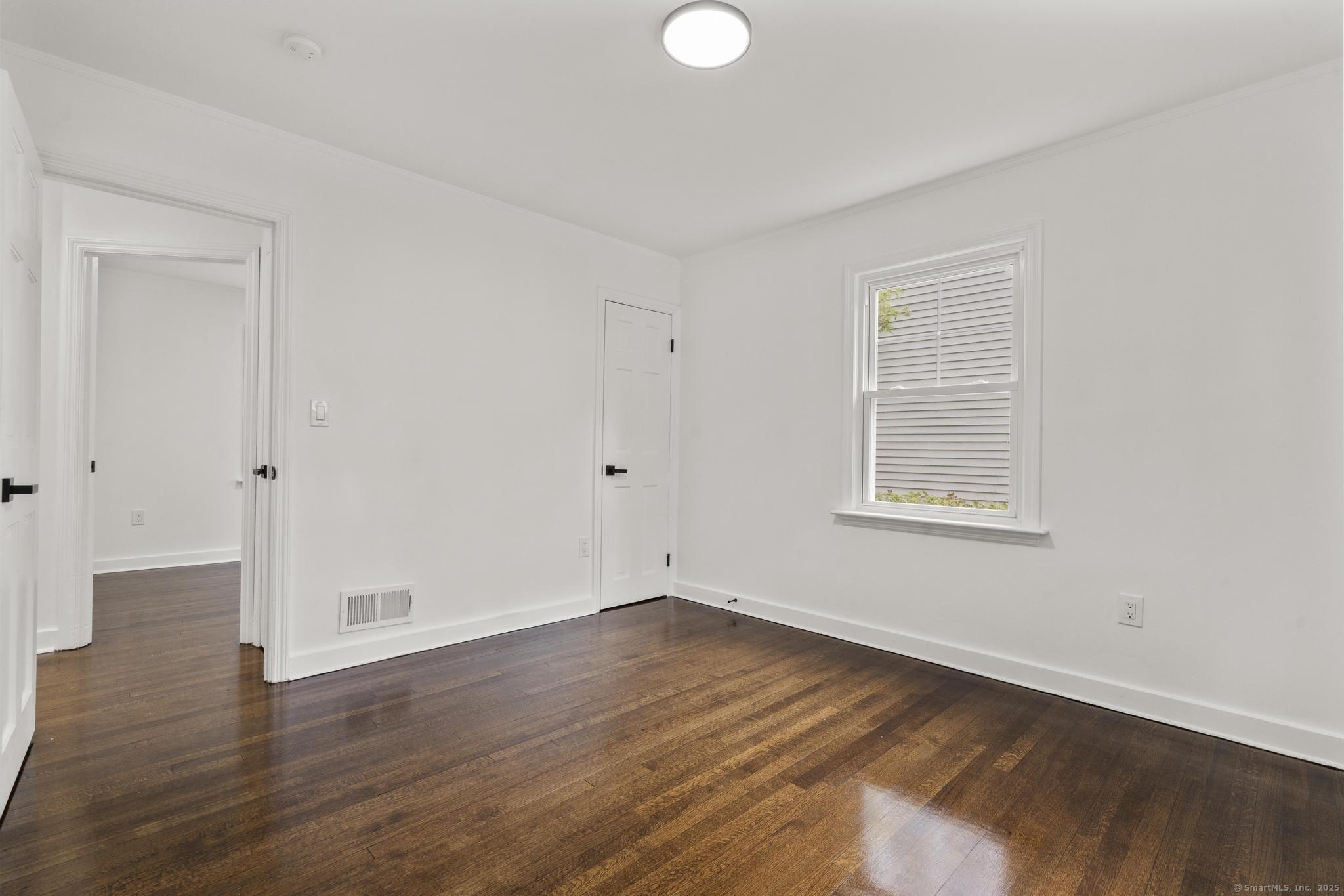 203 Gorham Avenue Hamden, CT 06514 - Photo 23 of 31 wooden floor in an empty room