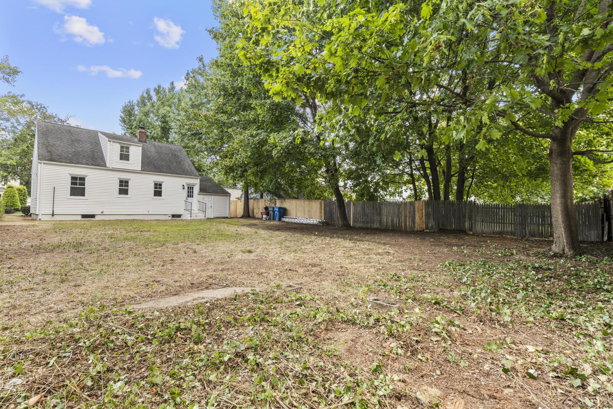 203 Gorham Avenue Hamden, CT 06514 - Photo 26 of 31 a front view of a house with a yard