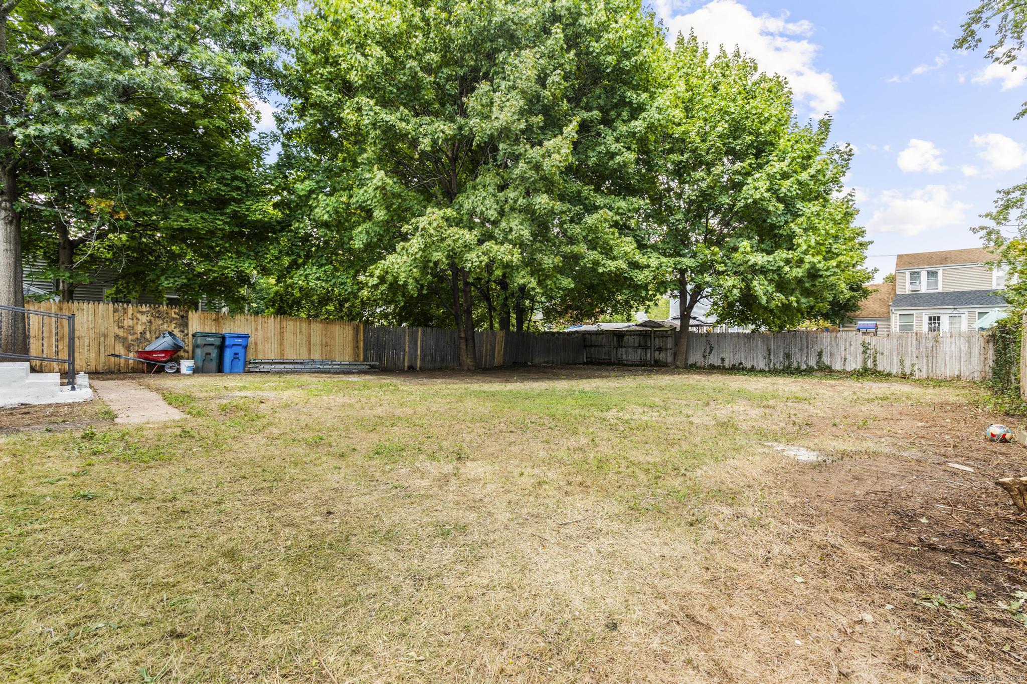 203 Gorham Avenue Hamden, CT 06514 - Photo 27 of 31 a house with swimming pool in front of it