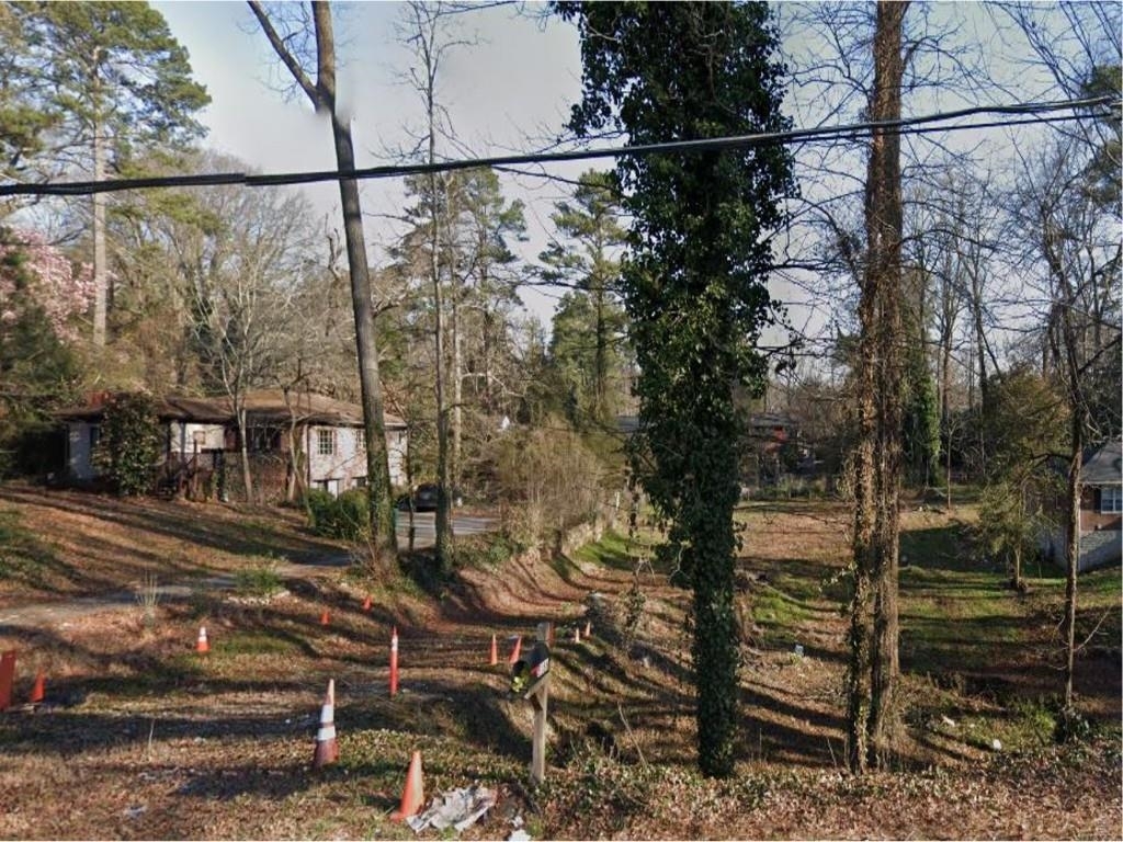 3186 North Druid Hills Road Northeast Decatur, GA 30033 - Photo 1 of 1 a view of a yard from a balcony
