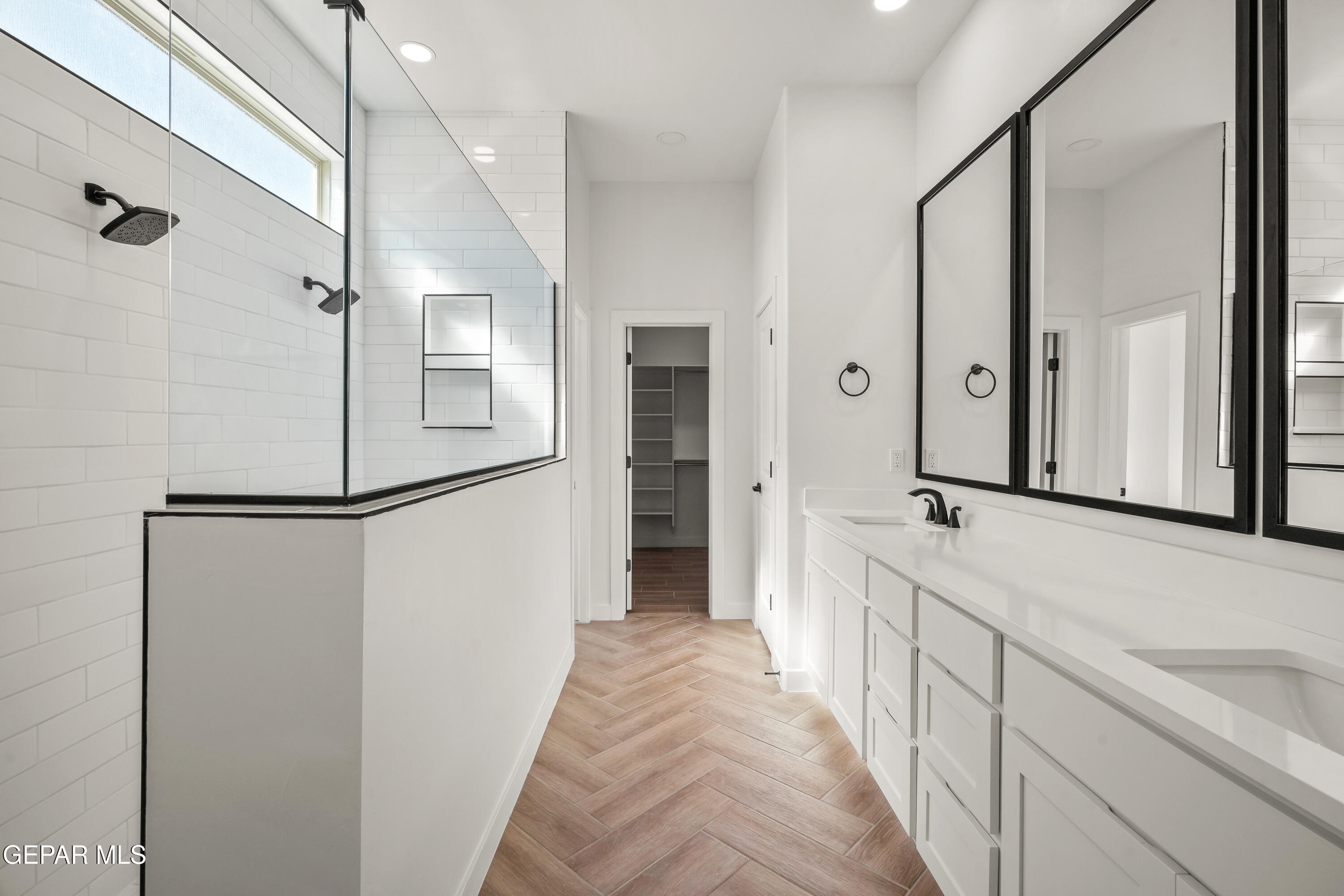 15241 Expectation El Paso, TX 79938 - Photo 30 of 38 a view of a hallway with wooden floor and staircase
