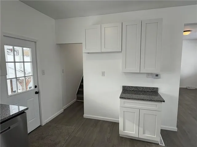 a bathroom with a toilet and a sink