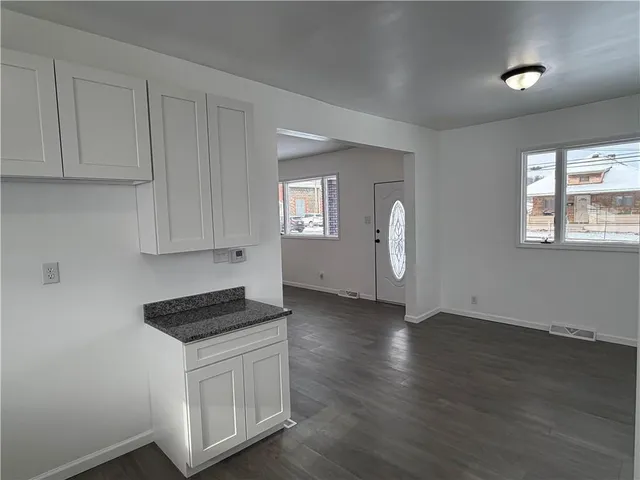 a bathroom with a toilet and a sink