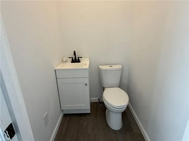 a view of kitchen with sink microwave and stove