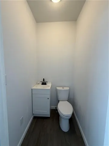 a view of a kitchen and a sink and a window