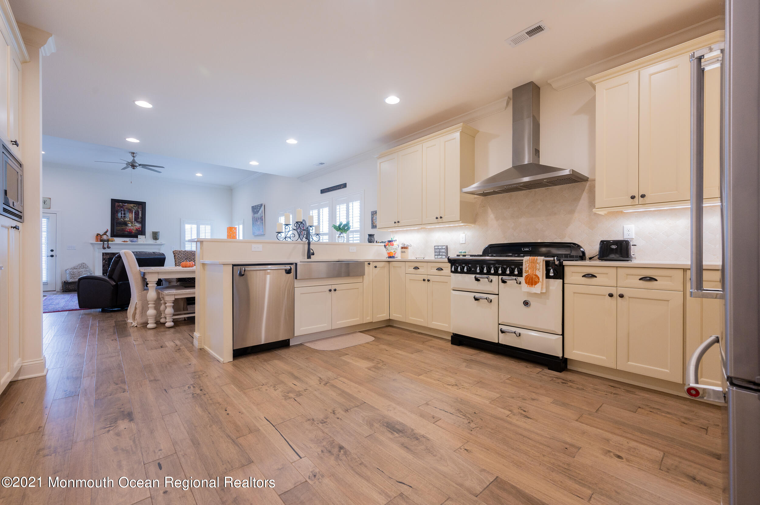 15 Starry Lane Barnegat, NJ 08005 - Photo 14 of 45 a kitchen with cabinets a sink and white stainless steel appliances