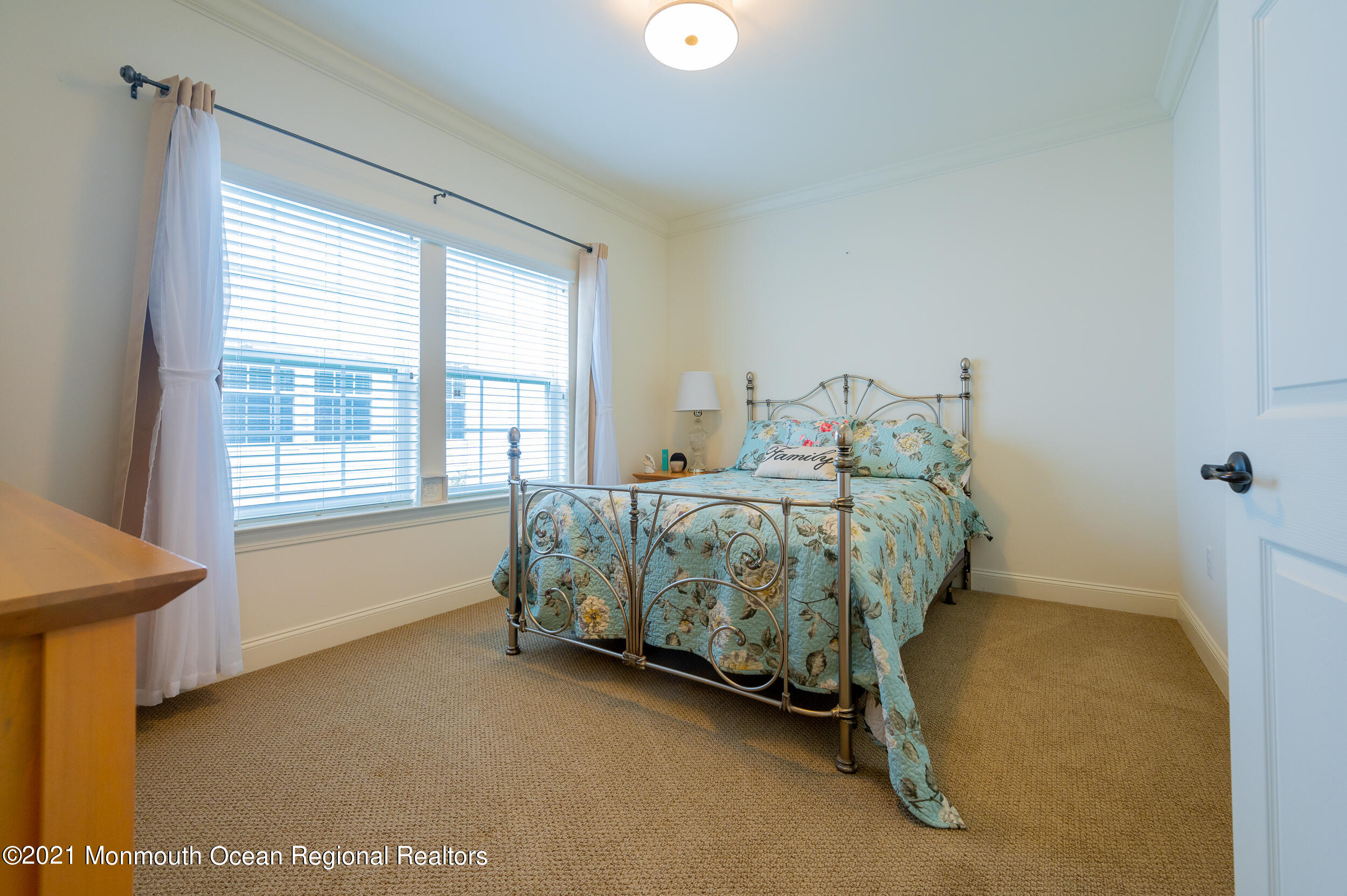 15 Starry Lane Barnegat, NJ 08005 - Photo 20 of 45 a bed sitting in a bedroom next to a window