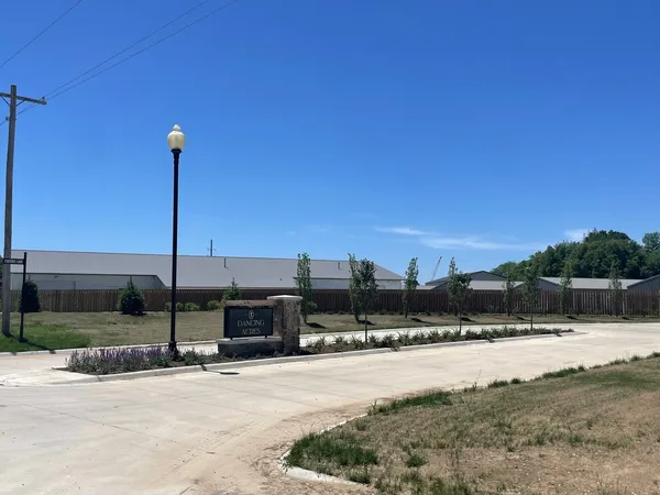 a view of a swimming pool with a house
