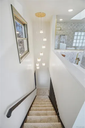 a view of a hallway with staircase
