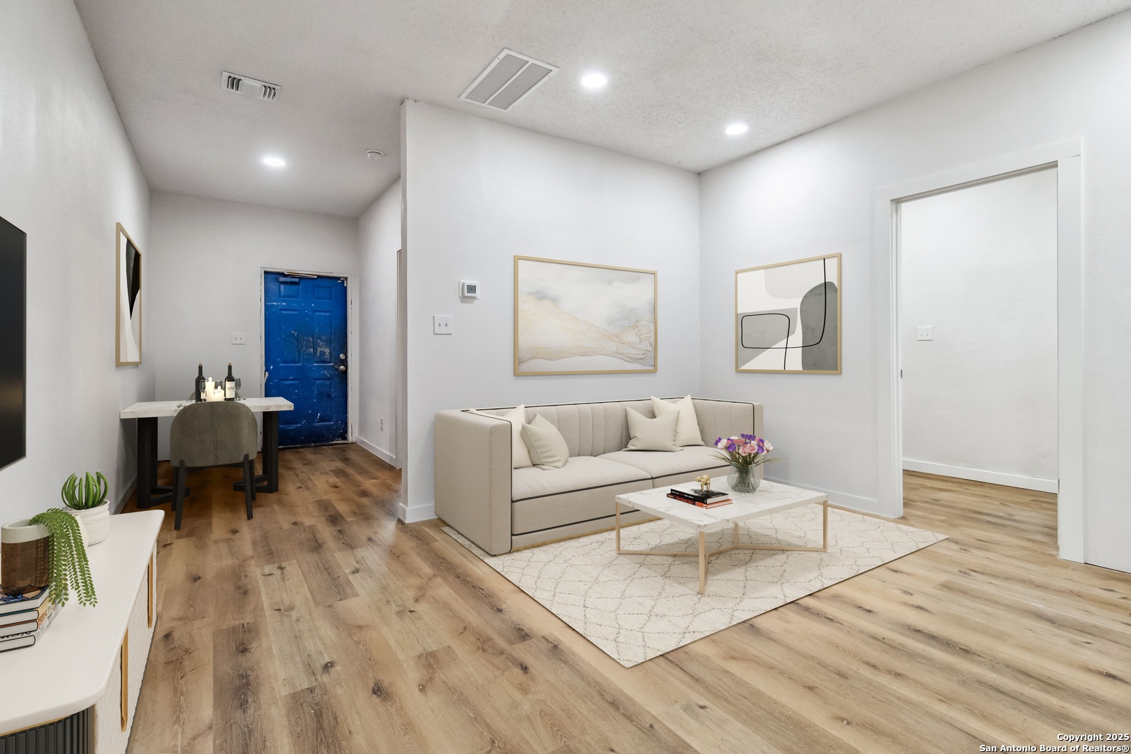 1206 West Hein Road, Unit 102 San Antonio, TX 78220 - Photo 1 of 7 a living room with furniture and a wooden floor