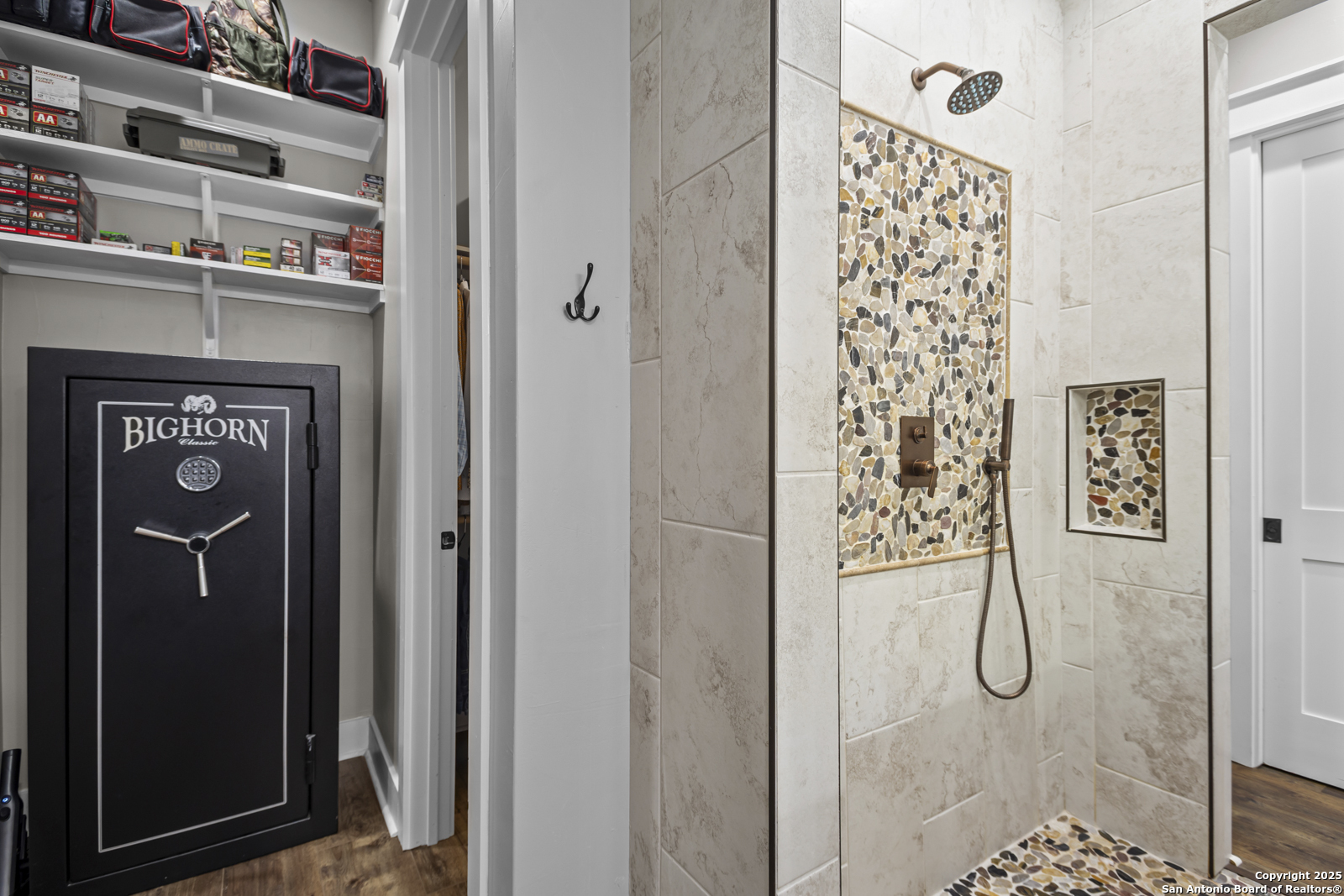 209 River Ridge Boerne, TX 78006 - Photo 24 of 60 a bathroom with a glass shower door